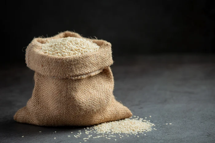 sesame-seeds-bag-dark-background